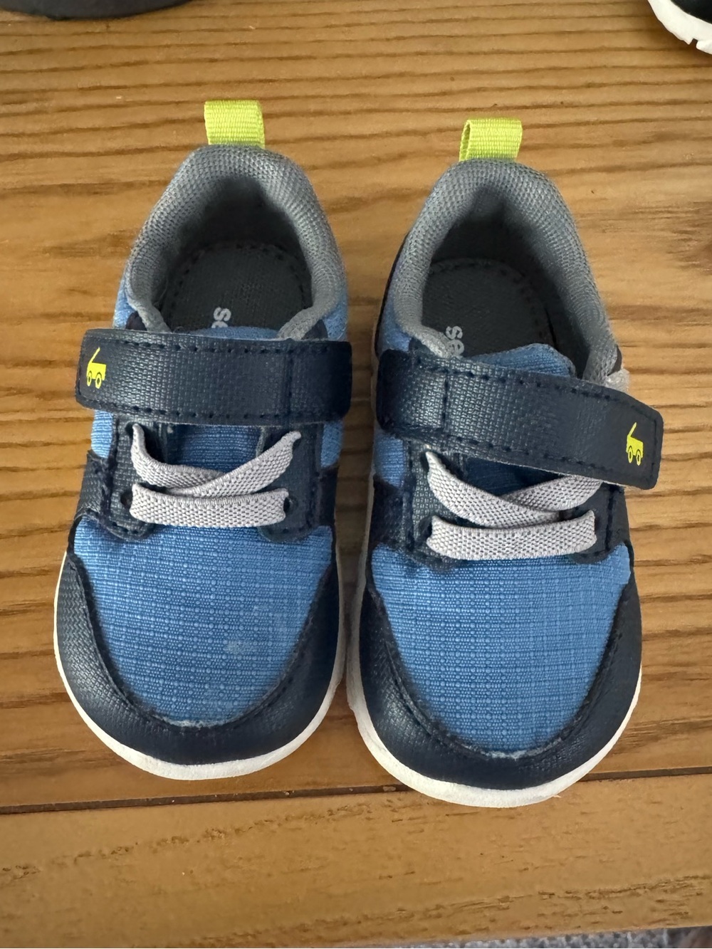 See Kai Run Blue and Navy Sneakers with Lime Pull Tab
